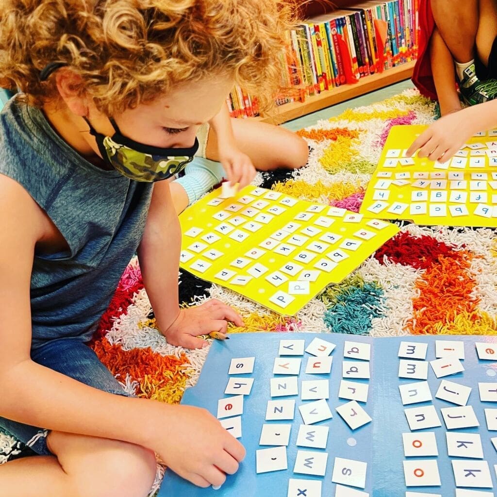Children using letters together