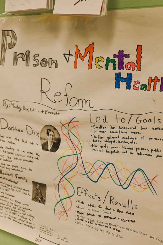 Theme work at micro school demonstrating social justice topic of prison and mental health reform.
